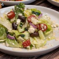 Greek Salad · (Feeds up to two) chopped romaine, red onion, cherry tomatoes, cucumbers, kalamata olives an...