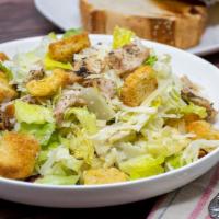 Caesar Salad With Grilled Chicken · Chopped romaine, Parmesan cheese, homemade croutons, house grilled chicken and Caesar dressi...
