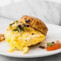 Cheddar & Chive Biscuit W/Eggs · 2 cage free eggs scrambled and served in a spicy cheddar and chive biscuit