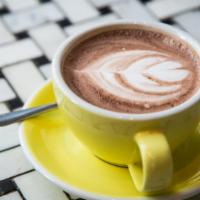 Hot Cacao 12Oz · French raw Cacao blended with your choice of Steamed Milk