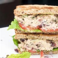 Wild Tuna Salad Sandwich · Wild Tuna, celery, parsley, dried cranberries, mayo, tomato & lettuce on either a waffle or ...