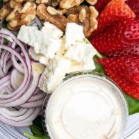 Strawberry Spinach Salad · Baby spinach,strawberries,feta cheese,walnuts,avocado,red onion w/ creamy oil dressing