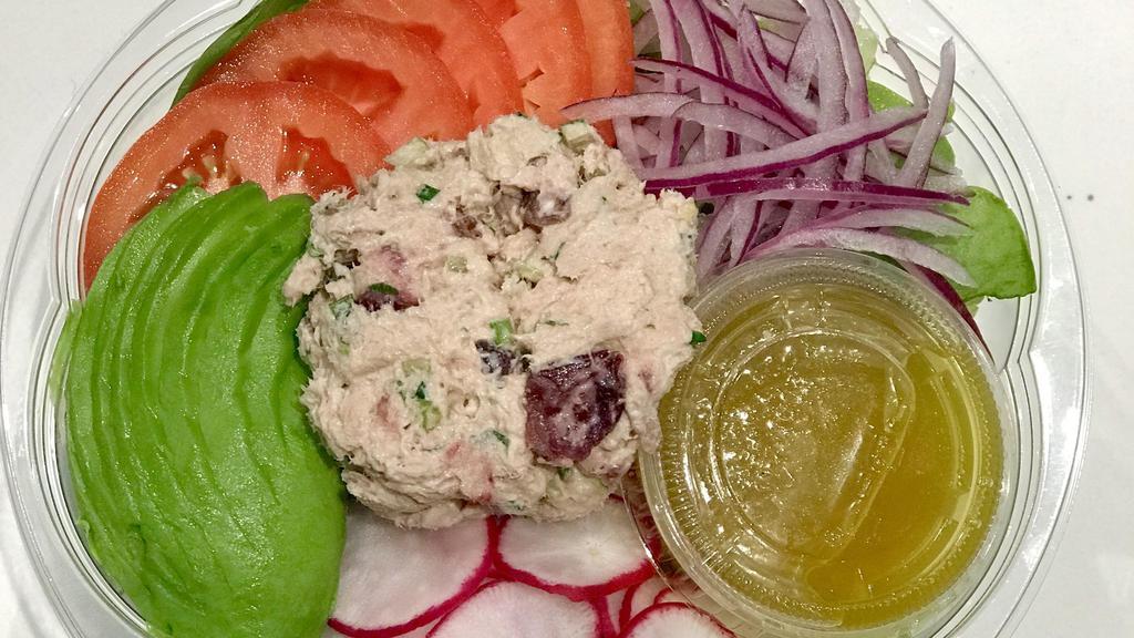 Tuna Salad Salad · Mixed Greens tuna salad mix (Tuna, celery, parsley, dried cranberries and mayo) sliced red onions, tomatoes, avocado, and radish with a mustard vinaigrette dressing.
