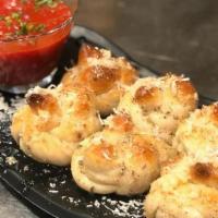 Garlic Knots · 6 knots served with a side of marinara