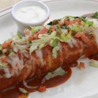 Burritos · Your Meat selection with rice & Beans.

Topped with cheese, cream & salad on side