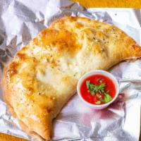 Calzone & 1 Filling · Choose any item from our pizza toppings.
