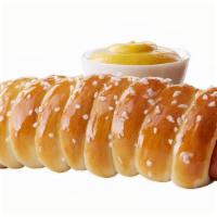 Pretzel Dog · Regular sized all beef hot dog wrapped in pretzel dough.  Sauces available.