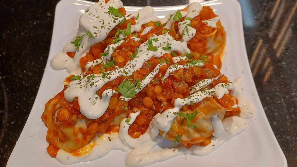 Mantu Appetizer (5 Pieces) · Steamed dumpling filled with ground beef, onion & scallion topped with homemade yogurt & tomatoes (meat sauce).