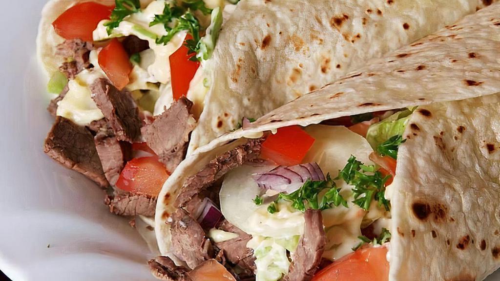 Lamb Gyro Wrap · Served with chips