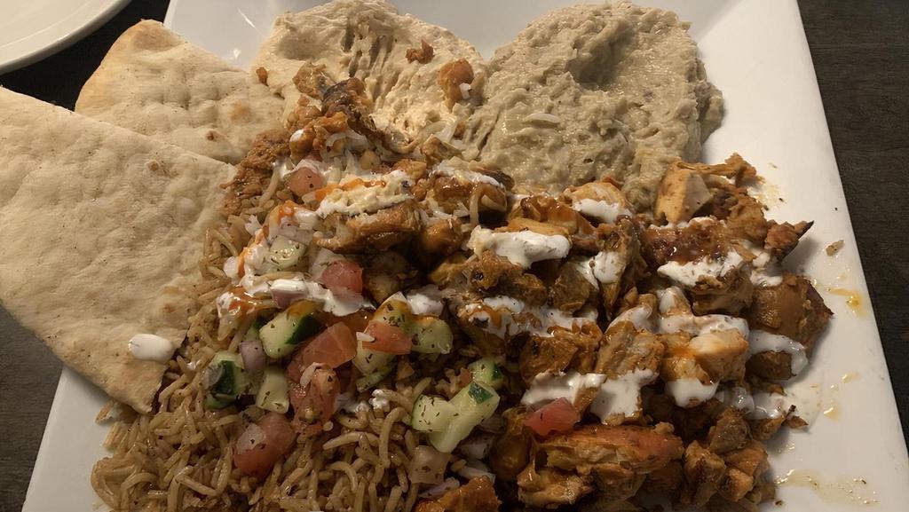 Mediterranean Platter · Hummus, baba ghanoush, green olives, falafel & Afghan salad.