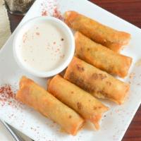 Potato Moroccan Cigars (5 Pc) · Rolled phyllo dough filled with  potato, served with tahini sauce.