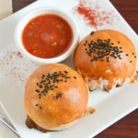 Beef Samsa (2 Pieces) · Stuffed with chopped onions and beeſ served with house tomato sauce.