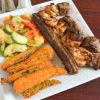 Mixed Grill · Baby chicken, beef and kofta kebab.