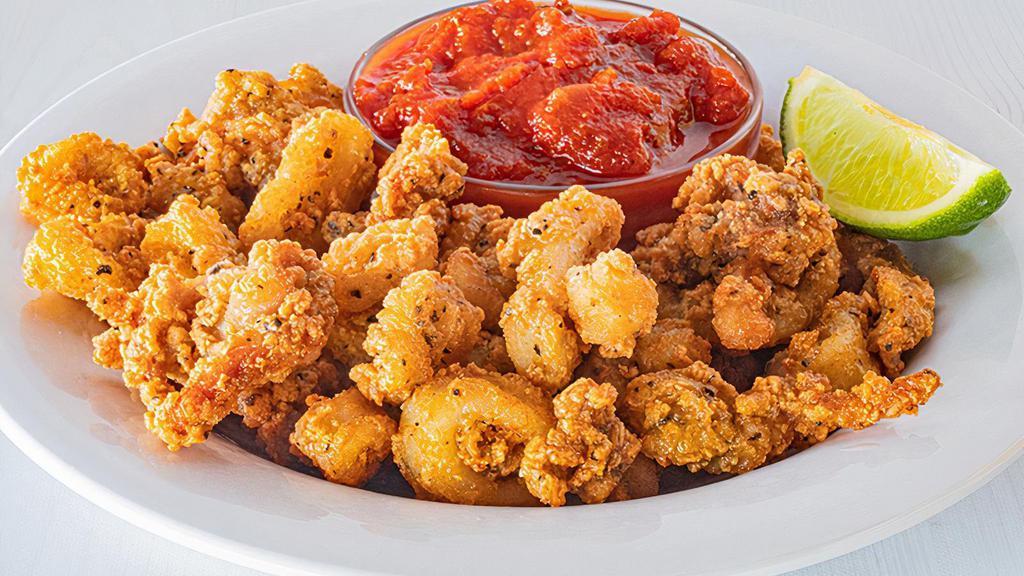Riptide Calamari · Get ready for a flavor wave. Lightly breaded and fried calamari served with marinara sauce for dipping. (970 cal.)