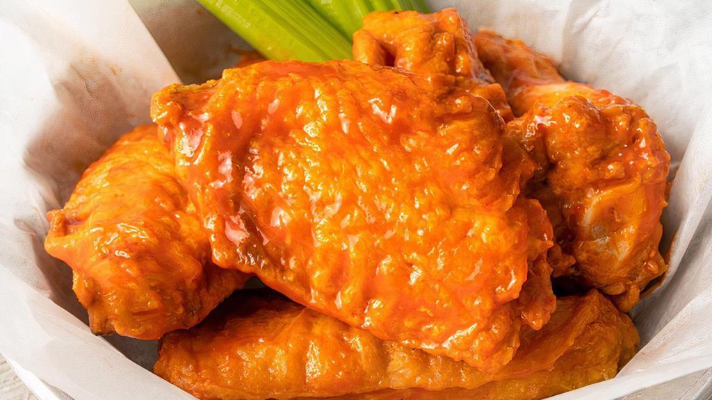 5 Wings · 5 Jumbo Bone-In Wings tossed in your choice of 1 sauce.  Served with celery and ranch or bleu cheese dressing for dipping.  (780-1180 cal)