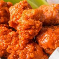 5 Boneless · 5 Boneless Wings tossed in your choice of sauce.  Served with celery and ranch or bleu chees...