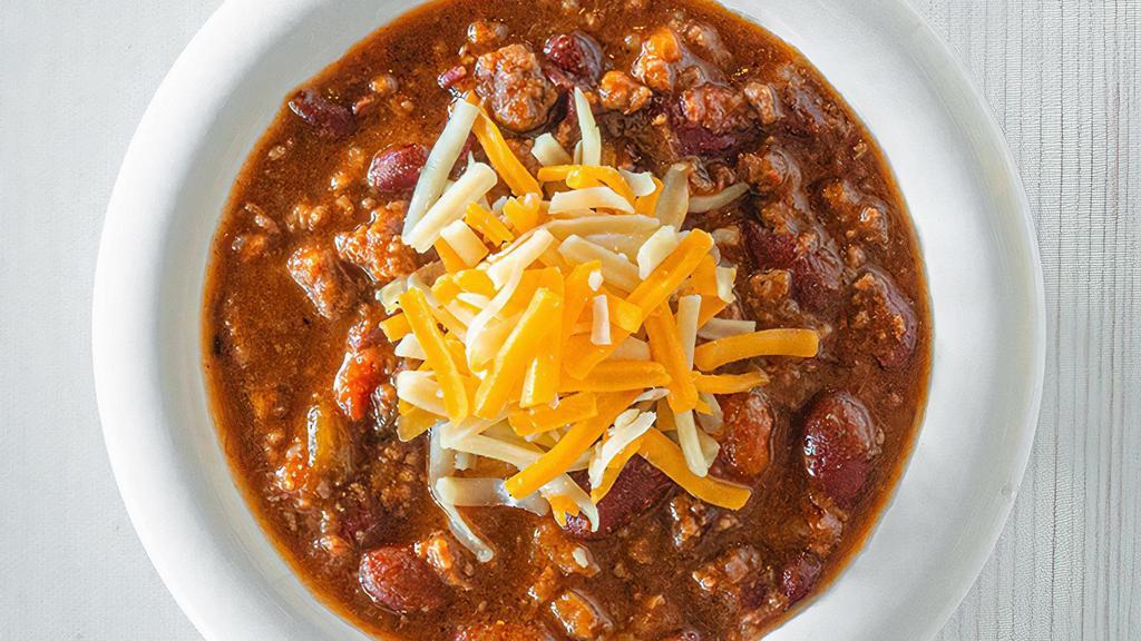 House Chili · Our hearty beef and red bean chili is topped with shredded cheddar jack cheese. (380 cal.)