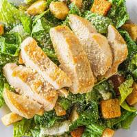 Chicken Caesar Salad · Starting with the crispiest of romaine lettuce in creamy Caesar dressing, this traditional f...