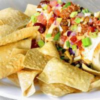 Smothered Burgerito · A seasoned all-beef pepper jack cheeseburger chopped and wrapped in a flour tortilla and top...