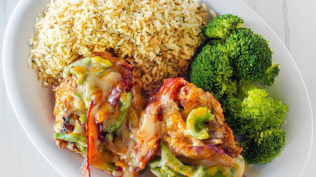Beachside Chicken · Grilled smoky mesquite chicken breasts topped with sauteed onions, peppers, bacon, cheddar jack cheese, drizzled in honey lime sauce. Served with two sides. (1160-1700 cal.)