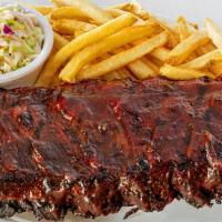 Hurricane Ribs - Half Rack · Smoked baby back ribs served with your choice of BBQ Sauce (770-1350 cal.)