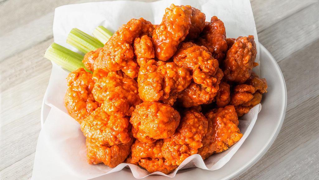 50 Boneless Wings · 50 Boneless Wings tossed in your choice of up to 4 sauces.  Served with celery and ranch or bleu cheese dressing for dipping.  (5200-9880 cal)