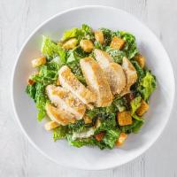 H2Go Chicken Caesar Salad · Crisp romaine tossed in a creamy Caesar dressing and topped with grilled or crispy chicken, ...