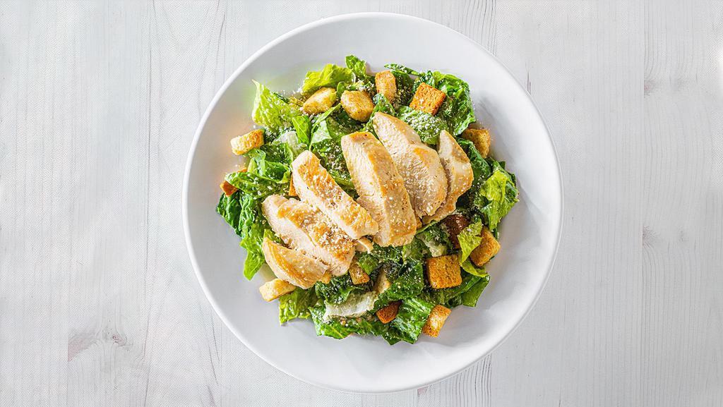 H2Go Chicken Caesar Salad · Crisp romaine tossed in a creamy Caesar dressing and topped with grilled or crispy chicken, parmesan and croutons.  (1790 cal)