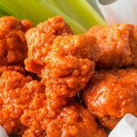 Kid Boneless (4) · Cooked to order, four natural wings. Served with 1 sauce, celery sticks and your choice of r...