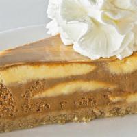 Sea Salt Caramel Cheesecake · Our creamy New York style cheesecake is smothered in a gooey layer of Hershey's caramel spri...