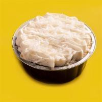 Tropical Coconut  · Sweet tropical coconut cake with coconut flakes and soaked in coconut crème topped  w/ cocon...