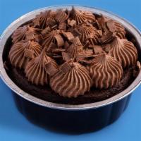 Deep Chocolate Cake · Moist rich chocolate cake topped with chocolate buttercream  and chocolate shavings