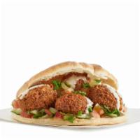 Falafel Sandwich · Grounded chickpea mix with onions, parsley, cilantro, garlic and spices; deep-fried.