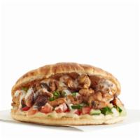 Spicy Grilled Chicken Sandwich · Grilled marinated chicken thighs with our signature spices. Pita with a spread of hummus and...