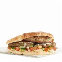Lamb Kofta Sandwich · Grilled lamb patty with onions, parsley, mint and spices.