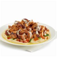 Spicy Grilled Chicken Salad · Grilled marinated chicken thighs with our signature spices.