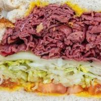 Pastrami Sandwich · Smoked and cured beef sandwich.