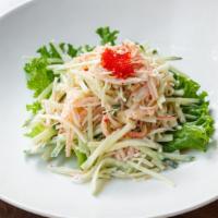 Kani Su · Crabmeat and cucumber. Served with ponzu sauce.