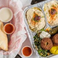4 Falafel Vegetarian Platter · 3 piece falafel, with hummus, Baba ghanouj, tabouleh, grape leaves, feta, salad, tahini, and...