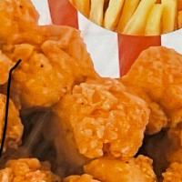 Popcorn Chicken · With fries and soda.