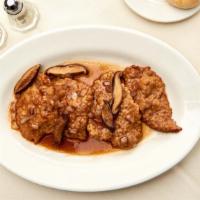 Chicken Marsala · Onions, prosciutto di parma & mushrooms in marsala sauce