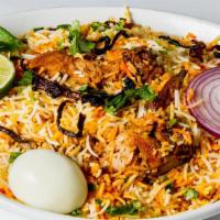 Chicken Dum Biryani · Spicy, gluten free. Uniquely layered Hyderabadi biryani (Persis) cooked in a traditional Naw...