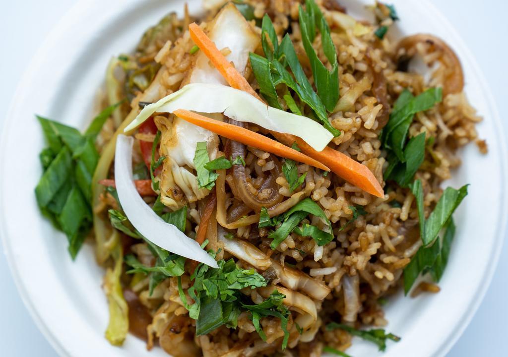 Veg Fried Rice · Vegan. Stir-fried rice mixed with carrots, onions, green onions and peas and soy sauce