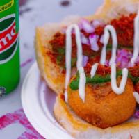 Vada Pav · Bread rolls stuffed with a golden-fried spiced potato, drizzled with mint-coriander chutney,...