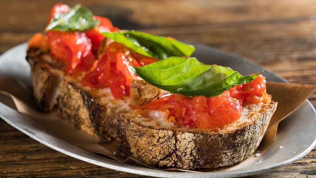 Crostone Bruschetta · garlic, sea salt, crushed tomato, homemade toasted bread, Felice extra virgin olive oi