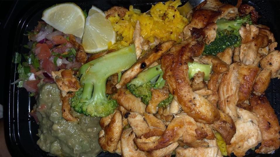 Pollo Con Maduro Y Arroz · Grilled chicken served with yellow plantain, rice and vegetables.