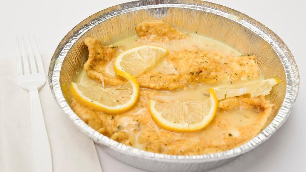 Chicken Francaise · Tender pieces of chicken dipped in egg batter and lemon sauce. Served with pasta or salad and bread.