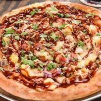 Hawaiian Bbq Chicken Pizza · Savory pie with a dough base topped with sauce and cheese.