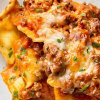 Baked Cheese Ravioli With Chicken · Stuffed pasta.