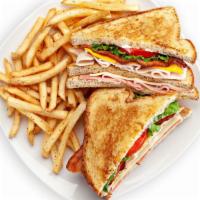 Triple Decker Club Sandwich · Ham, smoked turkey breast, bacon, American and Swiss cheeses, toasted wheat bread, lettuce, ...